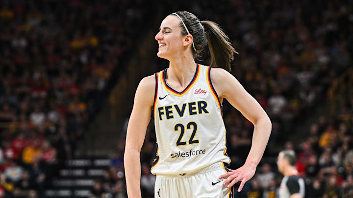 Indiana Fever guard Caitlin Clark (22) reacts during the first quarter against the Brazil National Team at Carver-Haweye Arena.