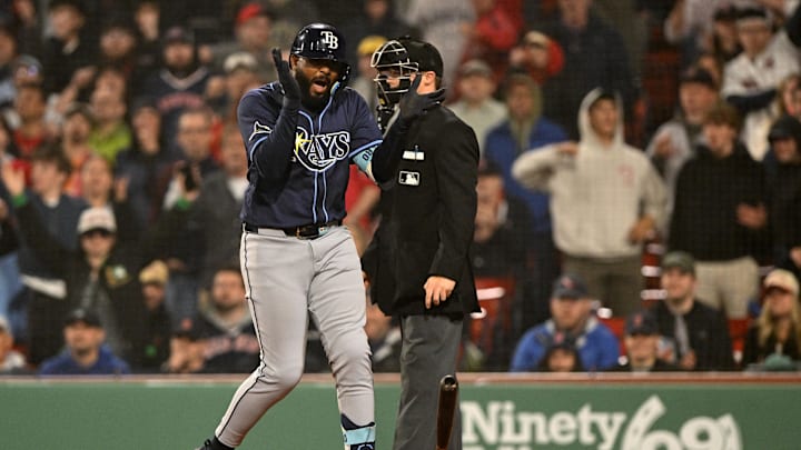 Tampa Bay Rays third baseman Junior Caminero (13) reacts after being walked allowing for a run to score against the Boston Red Sox Brian Fluharty-Imagn Images