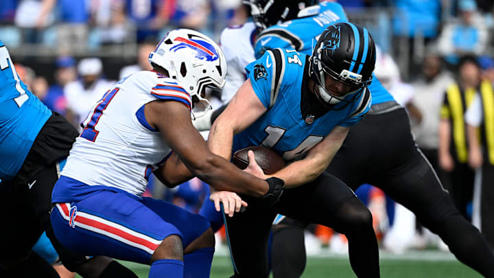 Oct 26, 2025; Charlotte, North Carolina, USA; Buffalo Bills defensive tackle Ed Oliver (91) sacks Carolina Panthers quarterback Andy Dalton (14) during the first half at Bank of America Stadium. Mandatory Credit: Bob Donnan-Imagn Images Oct 26, 2025; Charlotte, North Carolina, USA; Buffalo Bills defensive tackle Ed Oliver (91) sacks Carolina Panthers quarterback Andy Dalton (14) during the first half at Bank of America Stadium. Mandatory Credit: Bob Donnan-Imagn Images
