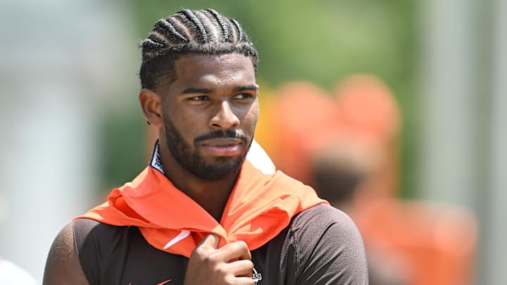 Jun 10, 2025; Berea, OH, USA; Cleveland Browns quarterback Shedeur Sanders (12) walks off the field during minicamp at CrossCountry Mortgage Campus. Mandatory Credit: Ken Blaze-Imagn Images Jun 10, 2025; Berea, OH, USA; Cleveland Browns quarterback Shedeur Sanders (12) walks off the field during minicamp at CrossCountry Mortgage Campus. Mandatory Credit: Ken Blaze-Imagn Images