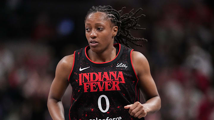 Indiana Fever guard Kelsey Mitchell (0) rushes up the court Tuesday, Aug. 12, 2025, during the game at Gainbridge Fieldhouse in Indianapolis. The Dallas Wings defeated the Indiana Fever, 81-80.