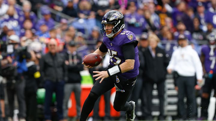 Oct 12, 2025; Baltimore, Maryland, USA; Baltimore Ravens quarterback Cooper Rush (15) scrambles against the Los Angeles Rams during the first quarter of the game at M&T Bank Stadium. Mandatory Credit: Peter Casey-Imagn Images Oct 12, 2025; Baltimore, Maryland, USA; Baltimore Ravens quarterback Cooper Rush (15) scrambles against the Los Angeles Rams during the first quarter of the game at M&T Bank Stadium. Mandatory Credit: Peter Casey-Imagn Images