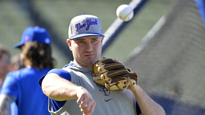 Oct 13, 2024; Los Angeles, California, USA; New York Mets first base Pete Alonso (20) practices before game one of the NLCS for the 2024 MLB Playoffs at Dodger Stadium.
