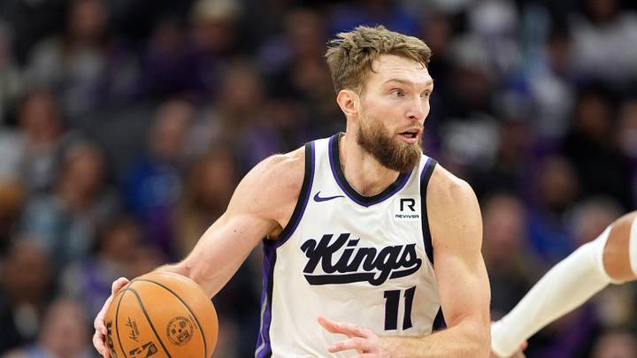 Dec 30, 2024; Sacramento, California, USA; Sacramento Kings forward Domantas Sabonis (11) dribbles against the Dallas Mavericks during the third quarter at Golden 1 Center.