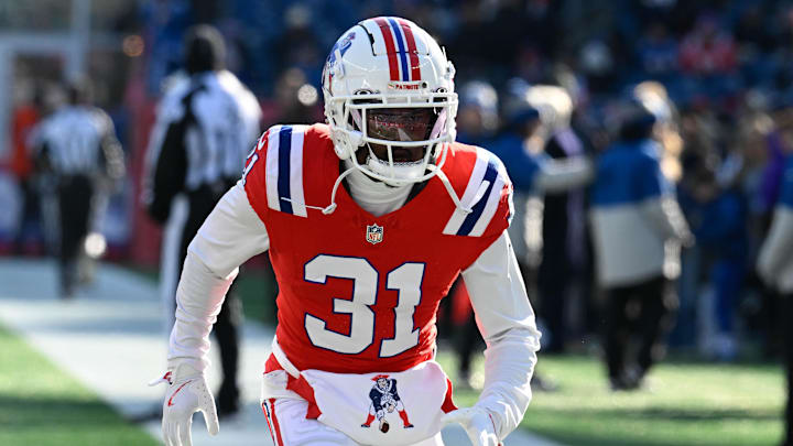 Dec 1, 2024; Foxborough, Massachusetts, USA; New England Patriots cornerback Jonathan Jones (31) warms up before a game against the Indianapolis Colts at Gillette Stadium.