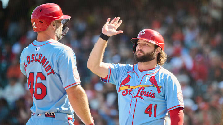 Sep 28, 2024; San Francisco, California, USA; St. Louis Cardinals outfielder Alec Burleson (41) celebrates with infielder Paul Goldschmidt (46) after both players scored runs against the San Francisco Giants during the seventh inning at Oracle Park. Mandatory Credit: Robert Edwards-Imagn Images Sep 28, 2024; San Francisco, California, USA; St. Louis Cardinals outfielder Alec Burleson (41) celebrates with infielder Paul Goldschmidt (46) after both players scored runs against the San Francisco Giants during the seventh inning at Oracle Park. Mandatory Credit: Robert Edwards-Imagn Images