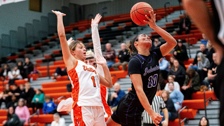 Johnston's Jenica Lewis (10) is fouled as she drives to the basket during a game against Valley on Feb. 6, 2026, at Valley High School.