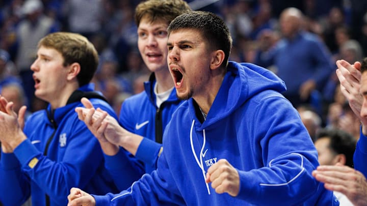Jan 18, 2025; Lexington, Kentucky, USA; Kentucky Wildcats guard Kerr Kriisa cheers on his teammates from the bench during the first half against the Alabama Crimson Tide at Rupp Arena at Central Bank Center. Mandatory Credit: Jordan Prather-Imagn Images