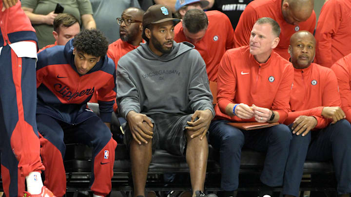 Los Angeles Clippers forward Kawhi Leonard (2) looks on from the bench during a preseason game against the Brooklyn Nets at Frontwave Arena. 