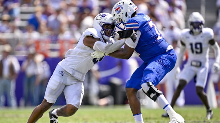 Sep 20, 2025; Fort Worth, Texas, USA; TCU Horned Frogs linebacker Kaleb Elarms-Orr (3) rushes the line against SMU Mustangs offensive lineman Andrew Chamblee (74) during the game between the TCU Horned Frogs and the SMU Mustangs at Amon G. Carter Stadium. Mandatory Credit: Jerome Miron-Imagn Images