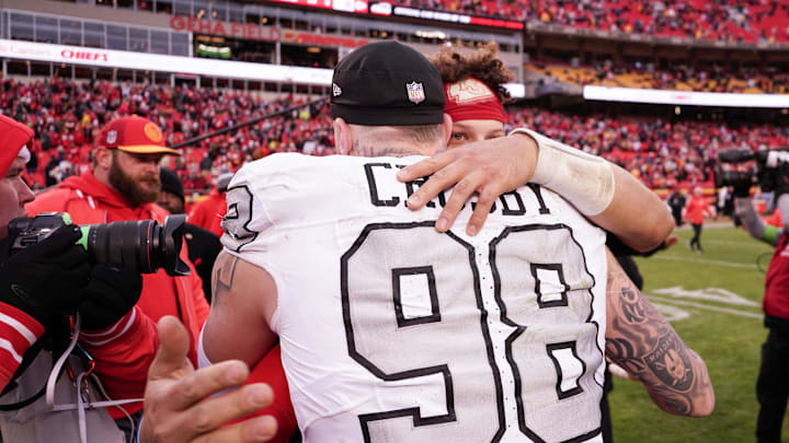 Dec 25, 2023; Kansas City, Missouri, USA; Kansas City Chiefs quarterback Patrick Mahomes (15) embraces Las Vegas Raiders defensive end Maxx Crosby (98) after the game at GEHA Field at Arrowhead Stadium. Mandatory Credit: Denny Medley-USA TODAY Sports Dec 25, 2023; Kansas City, Missouri, USA; Kansas City Chiefs quarterback Patrick Mahomes (15) embraces Las Vegas Raiders defensive end Maxx Crosby (98) after the game at GEHA Field at Arrowhead Stadium. Mandatory Credit: Denny Medley-USA TODAY Sports