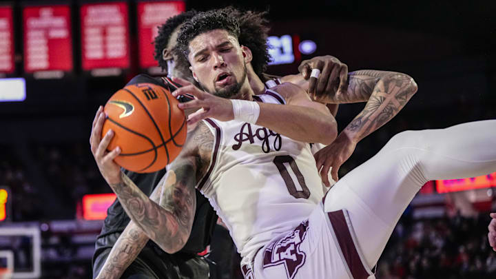 Mar 2, 2024; Athens, Georgia, USA; Texas A&M Aggies guard Jace Carter (0) tries to hold a