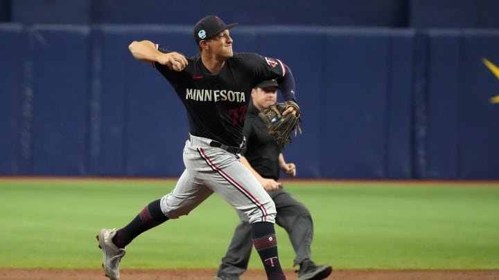 Mar 2, 2023; St. Petersburg, Florida, USA; Minnesota Twins shortstop Brooks Lee throws to first during the third inning at Tropicana Field. Mandatory Credit: Dave Nelson-USA TODAY Sports
