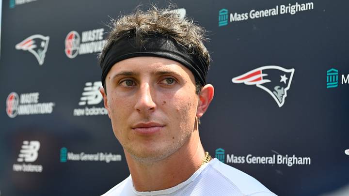 Aug 11, 2026; Foxborough, MA, USA; New England Patriots quarterback Tommy DeVito (16) speaks to the the media after practice during training camp at Gillette Stadium. Mandatory Credit: Eric Canha-Imagn Images Aug 11, 2026; Foxborough, MA, USA; New England Patriots quarterback Tommy DeVito (16) speaks to the the media after practice during training camp at Gillette Stadium. Mandatory Credit: Eric Canha-Imagn Images