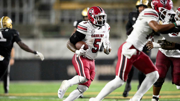 Nov 9, 2024; Nashville, Tennessee, USA; South Carolina Gamecocks running back Raheim Sanders (5) runs the ball against the Vanderbilt Commodores during the second half at FirstBank Stadium. Mandatory Credit: Steve Roberts-Imagn Images Nov 9, 2024; Nashville, Tennessee, USA; South Carolina Gamecocks running back Raheim Sanders (5) runs the ball against the Vanderbilt Commodores during the second half at FirstBank Stadium. Mandatory Credit: Steve Roberts-Imagn Images