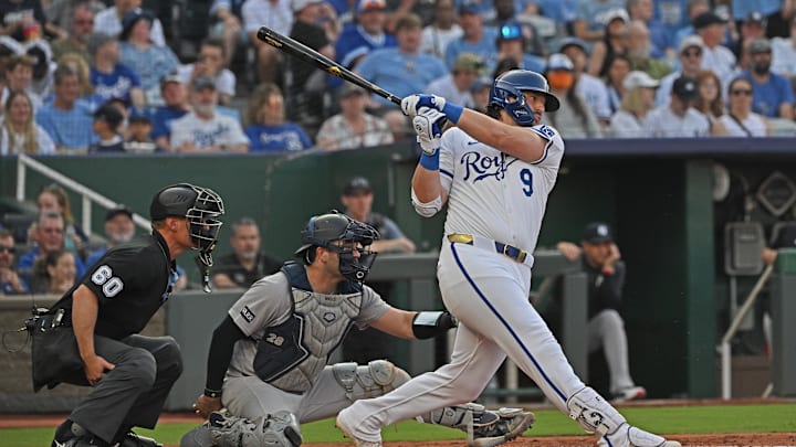 Jun 10, 2025; Kansas City, Missouri, USA;  Kansas City Royals designated hitter Vinnie Pasquantino (9) singles in the second inning against the New York Yankees at Kauffman Stadium. Mandatory Credit: Peter Aiken-Imagn Images