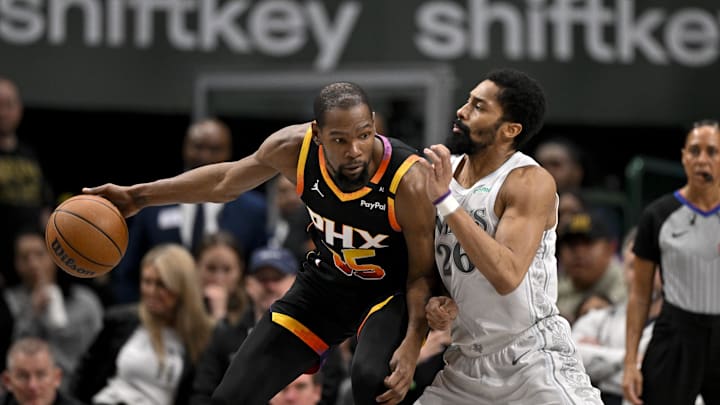 Mar 9, 2025; Dallas, Texas, USA; Phoenix Suns forward Kevin Durant (35) moves to the basket against Dallas Mavericks guard Spencer Dinwiddie (26) during the second half at the American Airlines Center. Mandatory Credit: Jerome Miron-Imagn Images