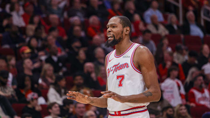 Dec 29, 2025; Houston, Texas, USA; Houston Rockets forward Kevin Durant (7) talks to a fan during a break against the Indiana Pacers in the third quarter at Toyota Center. Mandatory Credit: Thomas Shea-Imagn Images