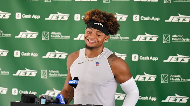 Jul 23, 2025; Florham Park, NY, USA; New York Jets quarterback Justin Fields (7) speaks at a press conference during training camp at Atlantic Health Jets Training Center. Mandatory Credit: John Jones-Imagn Images