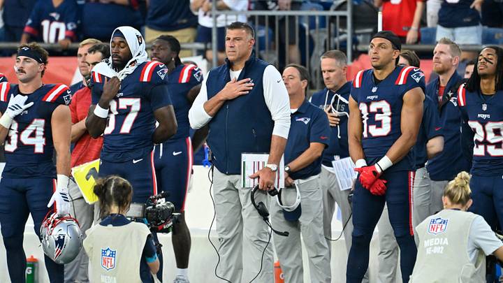 Aug 13, 2026; Foxborough, Massachusetts, USA; New England Patriots head coach Mike Vrabel holds his hand over his heart during the singing of the national anthem before a game against the Indianapolis Colts at Gillette Stadium. Mandatory Credit: Eric Canha-Imagn Images Aug 13, 2026; Foxborough, Massachusetts, USA; New England Patriots head coach Mike Vrabel holds his hand over his heart during the singing of the national anthem before a game against the Indianapolis Colts at Gillette Stadium. Mandatory Credit: Eric Canha-Imagn Images