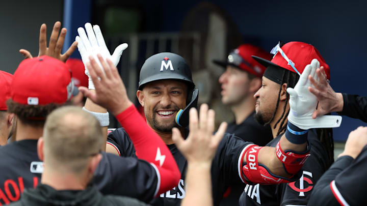 Feb 24, 2025; Port Charlotte, Florida, USA; Minnesota Twins third base Royce Lewis (23) celebrates with teammates after hitting a home run against the Tampa Bay Rays during the second inning at Charlotte Sports Park. Mandatory Credit: Kim Klement Neitzel-Imagn Images Feb 24, 2025; Port Charlotte, Florida, USA; Minnesota Twins third base Royce Lewis (23) celebrates with teammates after hitting a home run against the Tampa Bay Rays during the second inning at Charlotte Sports Park. Mandatory Credit: Kim Klement Neitzel-Imagn Images