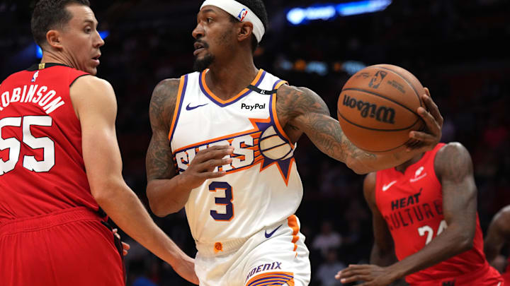 Dec 7, 2024; Miami, Florida, USA; Phoenix Suns guard Bradley Beal (3) controls the ball against Miami Heat forward Duncan Robinson (55) during the first half at Kaseya Center. Mandatory Credit: Jim Rassol-Imagn Images Dec 7, 2024; Miami, Florida, USA; Phoenix Suns guard Bradley Beal (3) controls the ball against Miami Heat forward Duncan Robinson (55) during the first half at Kaseya Center. Mandatory Credit: Jim Rassol-Imagn Images