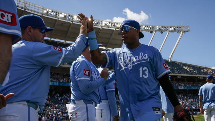 Jun 26, 2024; Kansas City, Missouri, USA; Kansas City Royals catcher Salvador Perez (13) celebrates with teammates after a game against the Miami Marlins at Kauffman Stadium. Mandatory Credit: William Purnell-USA TODAY Sports