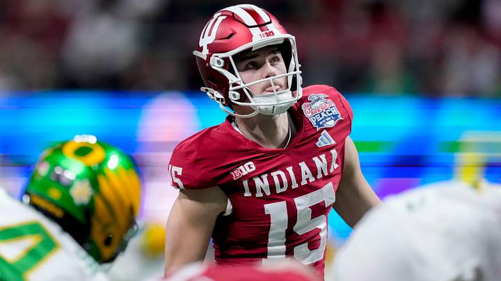 Indiana Hoosiers kicker Nicolas Radicic (15) watches his kick Friday, Jan. 9, 2026, during the Peach Bowl and semifinal game of the College Football Playoff against the Oregon Ducks at Mercedes-Benz Stadium in Atlanta.