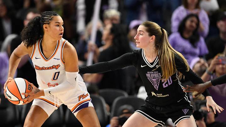 Aug 19, 2025; San Francisco, California, USA; Phoenix Mercury forward Satou Sabally (0) looks for a pass against Golden State Valkyries guard Kate Martin (20) in the fourth quarter at Chase Center. Mandatory Credit: Eakin Howard-Imagn Images