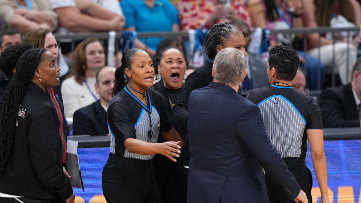 Apr 3, 2026; Phoenix, AZ, USA; UConn Huskies head coach Geno Auriemma and South Carolina Gamecocks head coach Dawn Staley react in the second half during a semifinal of the Final Four of the women's 2026 NCAA Tournament at Mortgage Matchup Center. Mandatory Credit: Joe Camporeale-Imagn Images