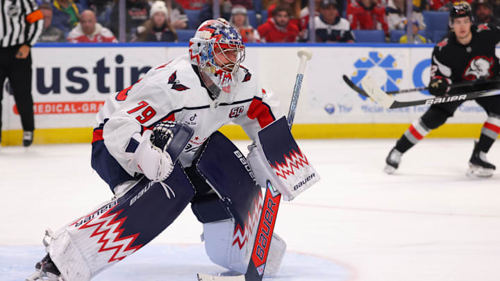 Jan 6, 2025; Buffalo, New York, USA;  Washington Capitals goaltender Charlie Lindgren (79) looks for the puck during the second period against the Buffalo Sabres at KeyBank Center. Mandatory Credit: Timothy T. Ludwig-Imagn Images