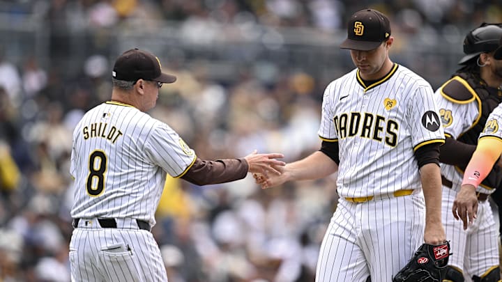 May 15, 2024; San Diego, California, USA; San Diego Padres manager Mike Shildt (8) takes the ball from starting pitcher Michael King (34) during a pitching change in the sixth inning against the Colorado Rockies at Petco Park. Mandatory Credit: Orlando Ramirez-Imagn Images May 15, 2024; San Diego, California, USA; San Diego Padres manager Mike Shildt (8) takes the ball from starting pitcher Michael King (34) during a pitching change in the sixth inning against the Colorado Rockies at Petco Park. Mandatory Credit: Orlando Ramirez-Imagn Images