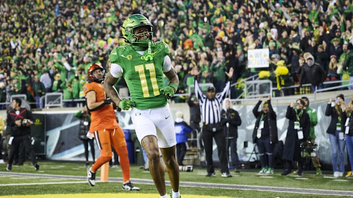 Nov 24, 2023; Eugene, Oregon, USA; Oregon Ducks wide receiver Troy Franklin (11) celebrates after