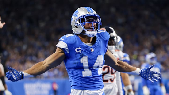Sep 14, 2025; Detroit, Michigan, USA; Detroit Lions wide receiver Amon-Ra St. Brown (14) celebrates after a play against the Chicago Bears during the first quarter at Ford Field. Mandatory Credit: David Reginek-Imagn Images