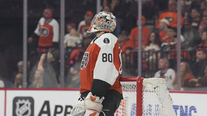 May 9, 2026; Philadelphia, Pennsylvania, USA; Philadelphia Flyers goaltender Dan Vladar (80) looks on during the second period against the Carolina Hurricanes in game four of the second round of the 2026 Stanely Cup Playoffs at Xfinity Mobile Arena. Mandatory Credit: James Lang-Imagn Images