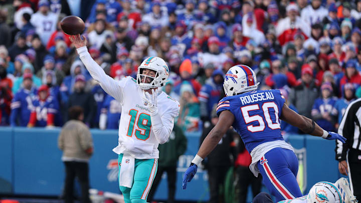 Miami quarterback Skylar Thompson gets rid of the ball before getting hit by Buffalo   s Greg
