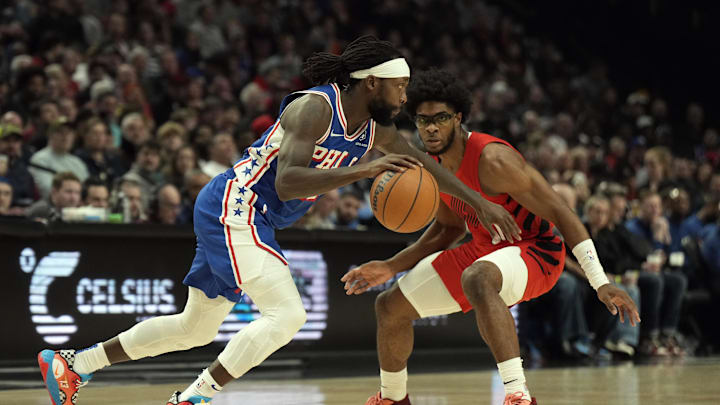 Jan 29, 2024; Portland, Oregon, USA; Philadelphia 76ers point guard Patrick Beverley (22) dribbles the ball while defended by Portland Trail Blazers guard Scoot Henderson (00, right) during the first half at Moda Center. Mandatory Credit: Soobum Im-Imagn Images Jan 29, 2024; Portland, Oregon, USA; Philadelphia 76ers point guard Patrick Beverley (22) dribbles the ball while defended by Portland Trail Blazers guard Scoot Henderson (00, right) during the first half at Moda Center. Mandatory Credit: Soobum Im-Imagn Images