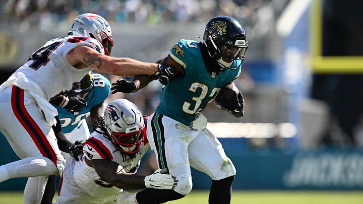 Sep 27, 2026; Jacksonville, Florida, USA;  New England Patriots safety Kevin Byard III (31) makes a tackle on Jacksonville Jaguars running back Bhayshul Tuten (33) during the fourth quarter at EverBank Stadium.  Mandatory Credit: Melina Myers-Imagn Images