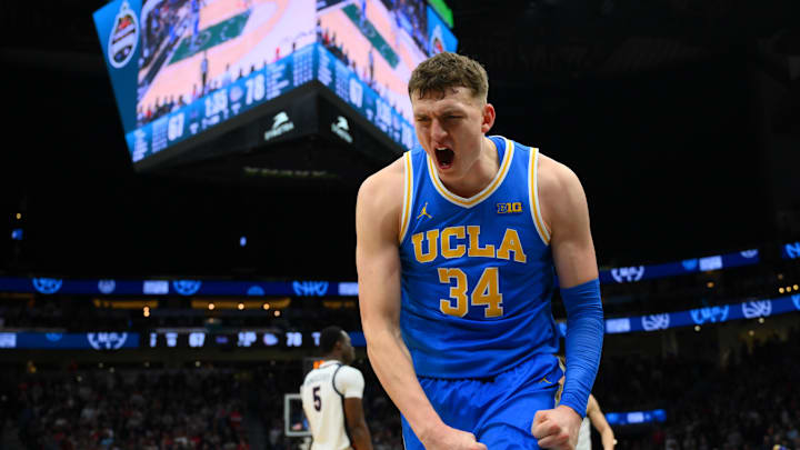 Dec 13, 2025; Seattle, Washington, USA; UCLA Bruins forward Tyler Bilodeau (34) reacts to making a basket against the Gonzaga Bulldogs during the second half at Climate Pledge Arena. Mandatory Credit: Steven Bisig-Imagn Images