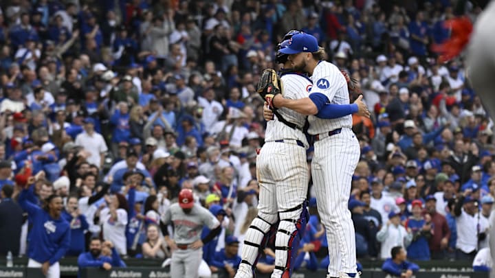 Sep 28, 2024; Chicago, Illinois, USA; Chicago Cubs pitcher Porter Hodge (37) hugs catcher Miguel Amaya (9) after the game against the Cincinnati Reds at Wrigley Field. Mandatory Credit: Matt Marton-Imagn Images Sep 28, 2024; Chicago, Illinois, USA; Chicago Cubs pitcher Porter Hodge (37) hugs catcher Miguel Amaya (9) after the game against the Cincinnati Reds at Wrigley Field. Mandatory Credit: Matt Marton-Imagn Images