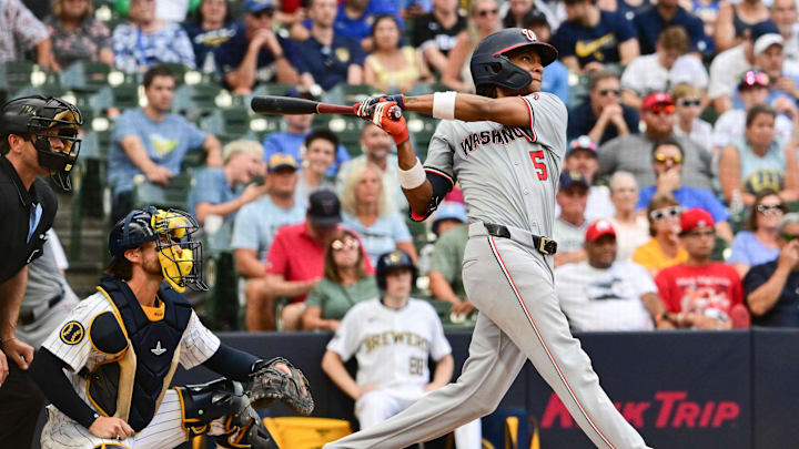 Washington Nationals shortstop C.J. Abrams (5) hits a 2-run home run against the Milwaukee Brewers in the ninth inning at American Family Field on July 13.