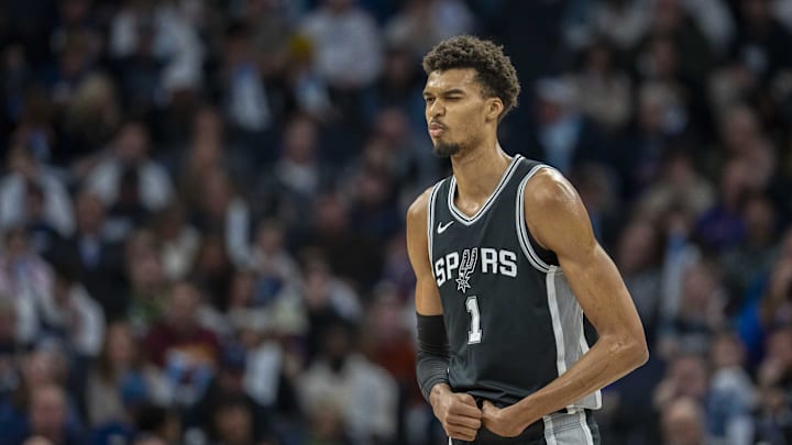 Dec 29, 2024; Minneapolis, Minnesota, USA; San Antonio Spurs center Victor Wembanyama (1) reacts after making a shot against the Minnesota Timberwolves in the first half at Target Center. Mandatory Credit: Jesse Johnson-Imagn Images