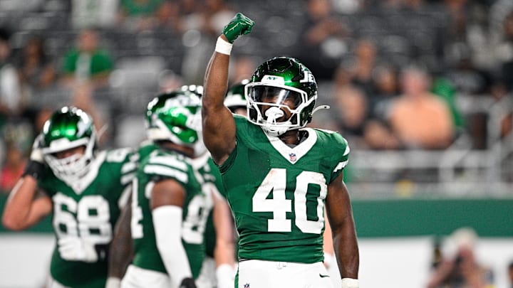 Aug 22, 2025; East Rutherford, New Jersey, USA; New York Jets running back Donovan Edwards (40) celebrates a touchdown during the fourth quarter against the Philadelphia Eagles at MetLife Stadium. Mandatory Credit: Mark Smith-Imagn Images