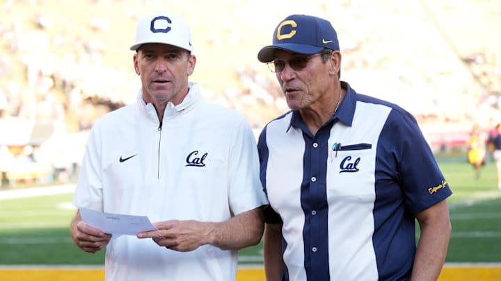 Sep 6, 2025; Berkeley, California, USA; California Golden Bears head coach Justin Wilcox (left) and general manager Ron Rivera (right) talk after defeating the Texas Southern Tigers at California Memorial Stadium. Mandatory Credit: Darren Yamashita-Imagn Images