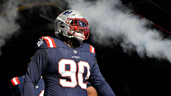 Nov 2, 2025; Foxborough, Massachusetts, USA; New England Patriots defensive tackle Christian Barmore (90) walks out of the tunnel before a game against the Atlanta Falcons at Gillette Stadium. 