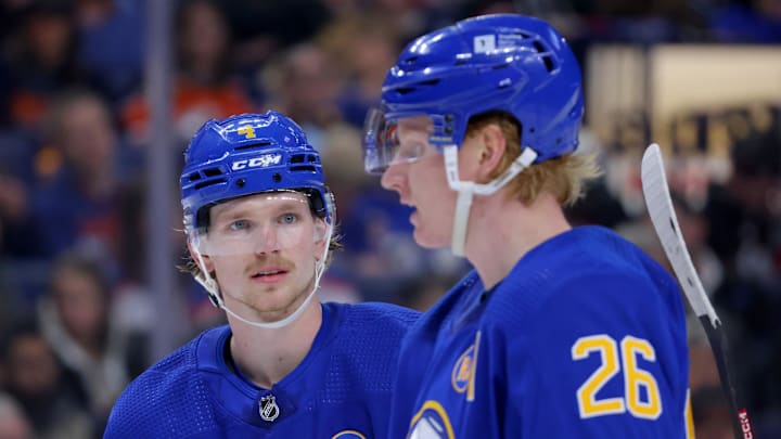 Mar 9, 2024; Buffalo, New York, USA;  Buffalo Sabres defenseman Bowen Byram (4) interacts with