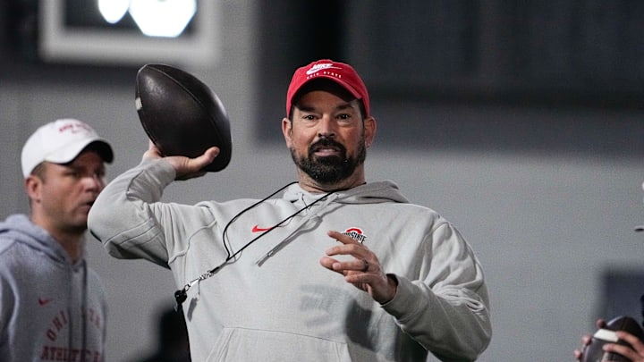 Ohio State Buckeyes head coach Ryan Day makes a pass during spring football practice at the Woody Hayes Athletic Center on Wednesday, March 19, 2025 in Columbus, Ohio.