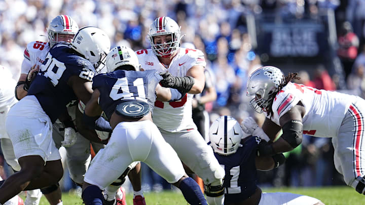 Ohio State Buckeyes offensive linemen Seth McLaughlin (56), Carson Hinzman (75) and Donovan Jackson (74) block during the NCAA football game against the Penn State Nittany Lions at Beaver Stadium in University Park, Pa. on Monday, Nov. 4, 2024. Ohio State won 20-13.
