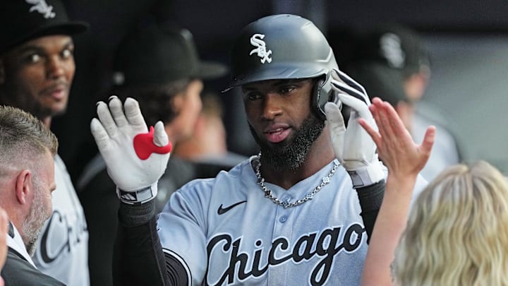 Jun 20, 2025; Toronto, Ontario, CAN; Chicago White Sox centre fielder Luis Robert Jr. (88) celebrates in the dugout after hitting a two run home run against the Toronto Blue Jays during the third inning at Rogers Centre. Mandatory Credit: Nick Turchiaro-Imagn Images