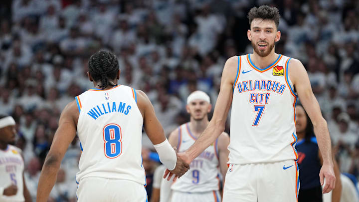 May 26, 2025; Minneapolis, Minnesota, USA;Oklahoma City Thunder forward Chet Holmgren (7) reacts with forward Jalen Williams (8)  in the second half during game four of the western conference finals for the 2025 NBA Playoffs at Target Center. Mandatory Credit: Jesse Johnson-Imagn Images